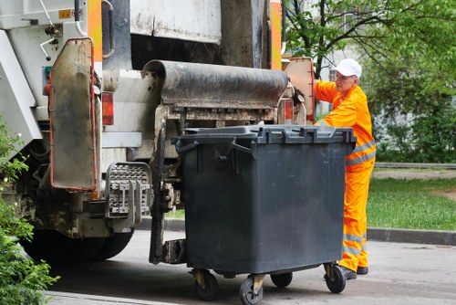 Workers sorting recyclable construction materials